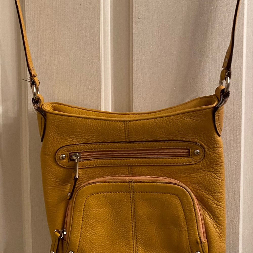 Tignanello crossbody bag. Loaded with storage. Light mustard